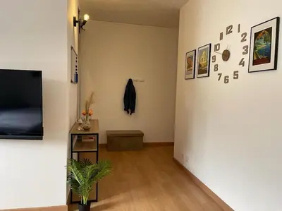 Télévision ou salle de divertissement dans l'établissement City Break plein centre & gare
