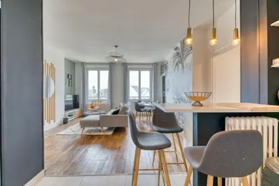Coin salon dans l'établissement Cosy Jungle Un magnifique F5