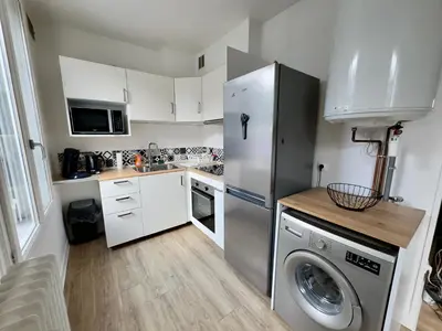 Cuisine ou kitchenette dans l'établissement Spacieux Appartement 3 chambres Au Pied De La Gare