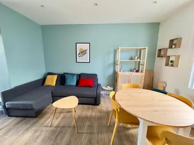 Coin salon dans l'établissement Spacieux Appartement 3 chambres Au Pied De La Gare