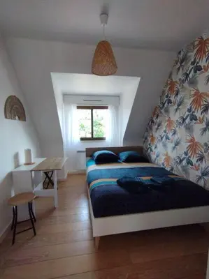 Un ou plusieurs lits dans un hébergement de l'établissement Le ptit nid de Louviers TV/Fibre