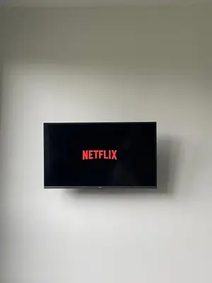 Télévision ou salle de divertissement dans l'établissement Studio vue sur Seine