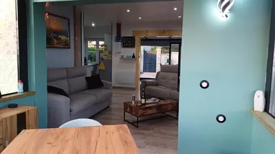 Coin salon dans l'établissement Maison classée 4 étoiles vue sur la mer