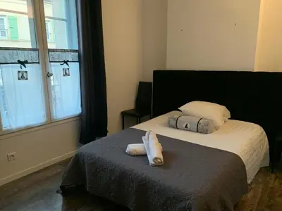 Un ou plusieurs lits dans un hébergement de l'établissement Magny en Vexin : Maison meublée