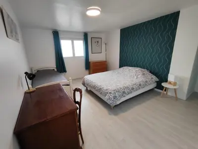 Un ou plusieurs lits dans un hébergement de l'établissement Le gîte des hallais