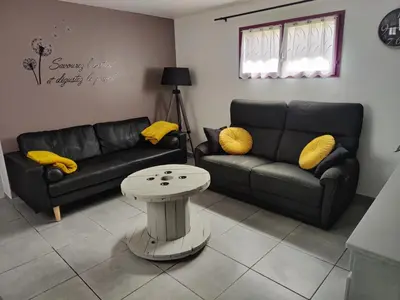 Coin salon dans l'établissement Le gîte des hallais