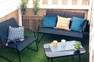 Coin salon dans l'établissement Le Chat Bleu - Terrasse sur les toits - Wifi