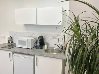 Cuisine ou kitchenette dans l'établissement Appt 1 à deux pas de la gare d'Amiens