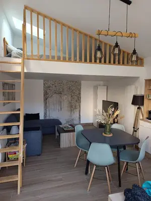 Coin salon dans l'établissement Maison Studio 4 personnes avec mezzanine