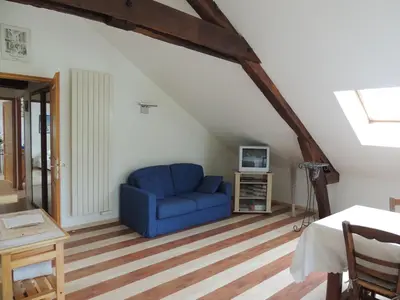 Télévision ou salle de divertissement dans l'établissement Chambre d'hôtes de Charleval