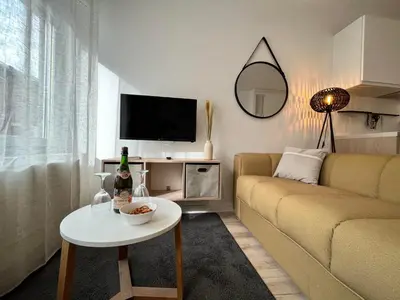 Télévision ou salle de divertissement dans l'établissement L'escale Amiénoise Loft
