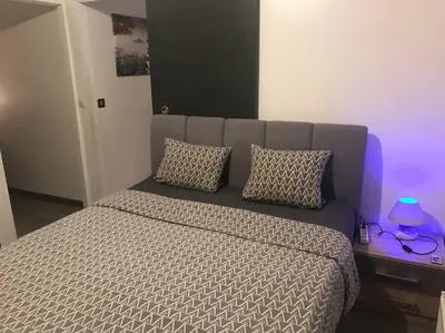 Un ou plusieurs lits dans un hébergement de l'établissement Proche PARIS/Casino d’Enghien/stade de France/CDG