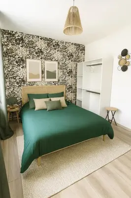 Un ou plusieurs lits dans un hébergement de l'établissement L'échappée MERs- Maison 3 chambres au Centre 500m de la plage