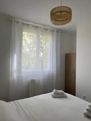Un ou plusieurs lits dans un hébergement de l'établissement Logement 10 minutes de rouen