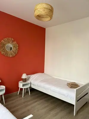 Un ou plusieurs lits dans un hébergement de l'établissement Logement 10 minutes de rouen