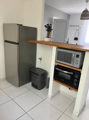 Cuisine ou kitchenette dans l'établissement Logement 10 minutes de rouen