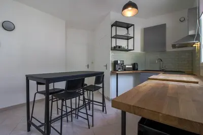 Cuisine ou kitchenette dans l'établissement La Perle Noire - Vernon Giverny