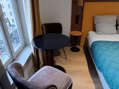 Un ou plusieurs lits dans un hébergement de l'établissement Suite st lô 1 Rouen (centre historique)