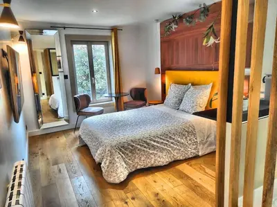 Un ou plusieurs lits dans un hébergement de l'établissement Suite st lô 1 Rouen (centre historique)
