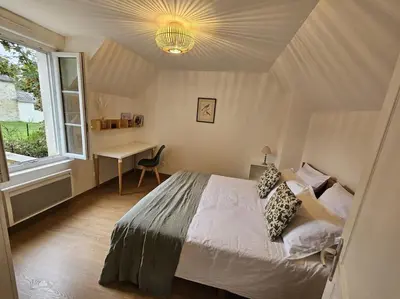 Un ou plusieurs lits dans un hébergement de l'établissement Gîte cosy à Chambly