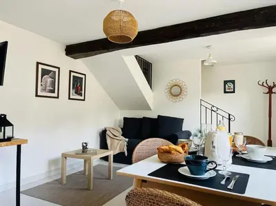 Coin salon dans l'établissement Gîte cosy à Chambly