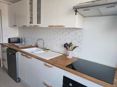 Cuisine ou kitchenette dans l'établissement L'escale marine BY HOLIDIEPPE