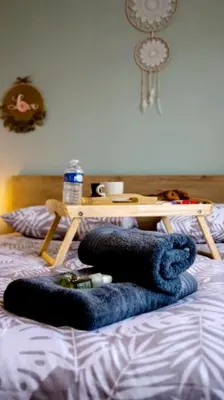 Un ou plusieurs lits dans un hébergement de l'établissement Casa Relax spa