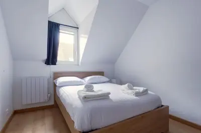 Un ou plusieurs lits dans un hébergement de l'établissement L'Elias : appartement de standing pour 6
