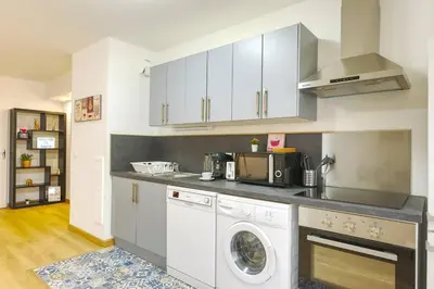 Cuisine ou kitchenette dans l'établissement L'Elias : appartement de standing pour 6