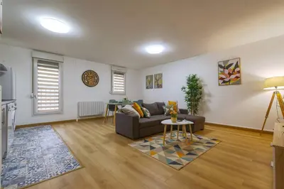 Coin salon dans l'établissement L'Elias : appartement de standing pour 6