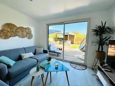 Coin salon dans l'établissement KosyHouse - Un petit coin de paradis-SPA & Massage