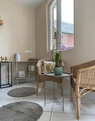 Coin salon dans l'établissement Le Manoir de Séverine
