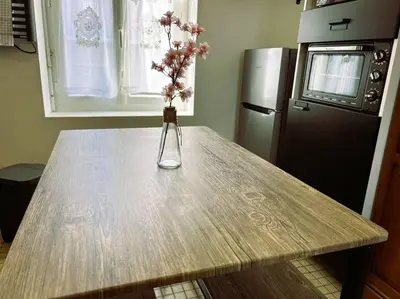 Cuisine ou kitchenette dans l'établissement Maison la coulée douce