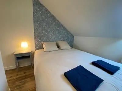 Un ou plusieurs lits dans un hébergement de l'établissement Maison de Charme - 4 Chambres - Courette & Parking Gratuit