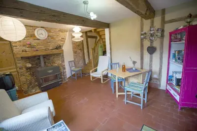 Coin salon dans l'établissement Chambres d'hôtes du Coq à l'Ane