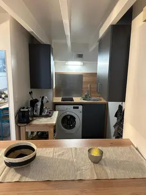Cuisine ou kitchenette dans l'établissement Appartement dans ancien Hôtel historique