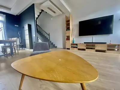 Télévision ou salle de divertissement dans l'établissement Maison 43