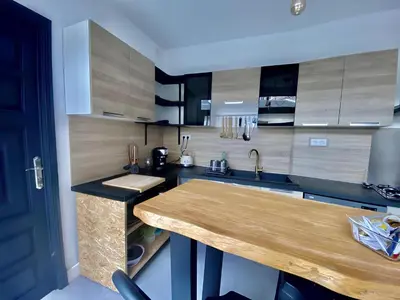 Cuisine ou kitchenette dans l'établissement Maison 43