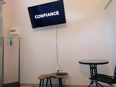 Télévision ou salle de divertissement dans l'établissement Superbe studio proche de toutes commodités