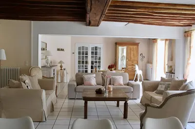 Coin salon dans l'établissement Chambres à la maison Hermitage