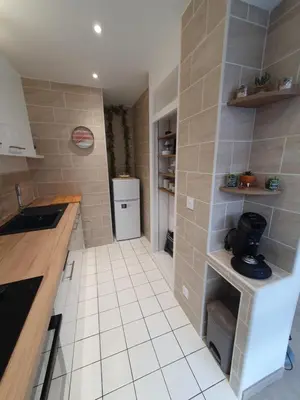 Cuisine ou kitchenette dans l'établissement CLUB APPART