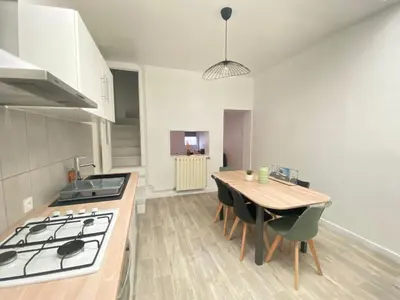 Cuisine ou kitchenette dans l'établissement Le Green suite