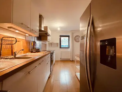 Cuisine ou kitchenette dans l'établissement Un moment familial - 279