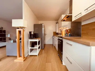 Cuisine ou kitchenette dans l'établissement Un moment familial - 279