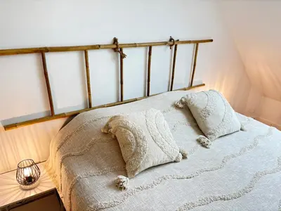 Un ou plusieurs lits dans un hébergement de l'établissement Maison 34 avec service de navette