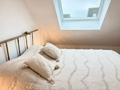 Un ou plusieurs lits dans un hébergement de l'établissement Maison 34 avec service de navette