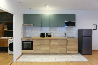 Cuisine ou kitchenette dans l'établissement La chute des feuilles - Bundle - Hyper centre