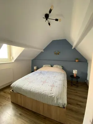 Un ou plusieurs lits dans un hébergement de l'établissement Cosy maison de ville Rouennaise