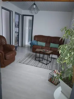 Coin salon dans l'établissement Appartement Cosy avec Terrasse
