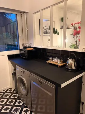 Cuisine ou kitchenette dans l'établissement Appartement Rouen centre proche CHU